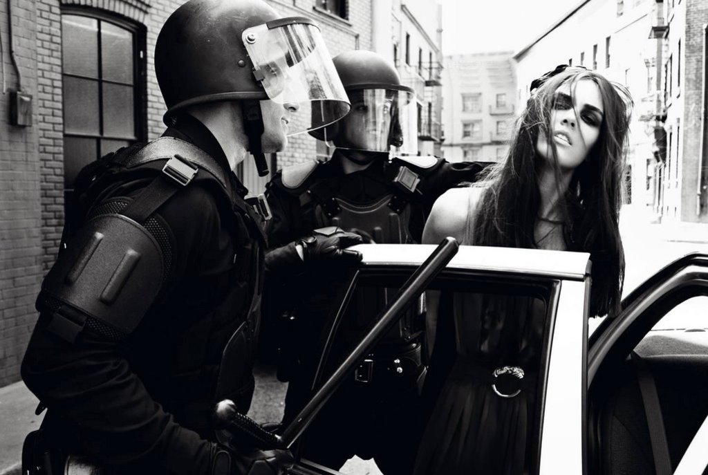 Editorial fashion photo for a girl with the police