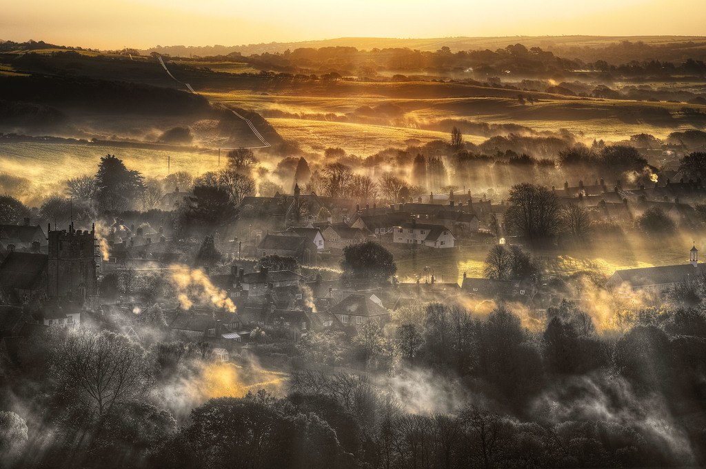 Morning Falls in Shards Over a Smoking Corfe