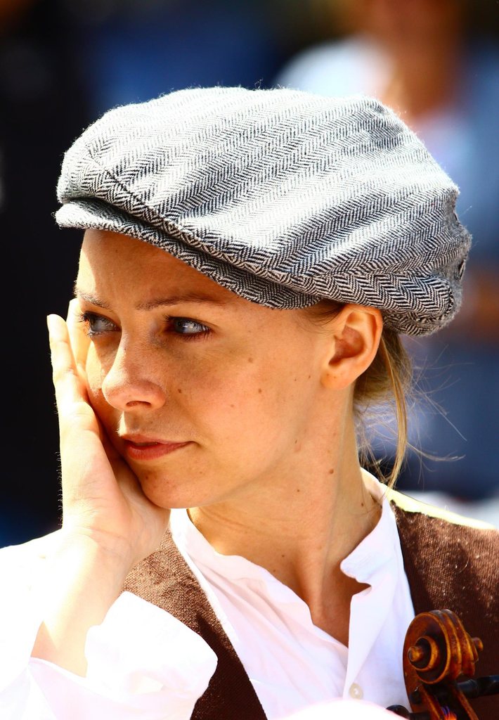 Woman portrait wearing a newsboy cap